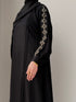 Close up texture shot of premium breathable black fabric used in Haya Abaya