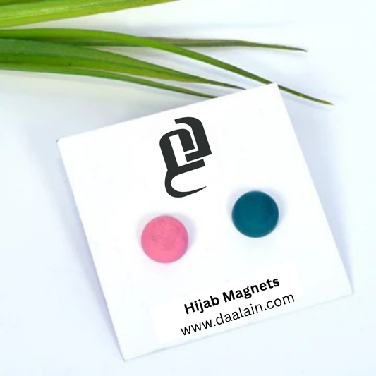dark green and pink magnet pair